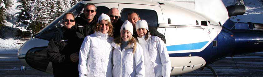 About Whitetracks Helicopters - Picture: Helicopter Pilots and Staff next to a Eurocopter AS350 single engine helicopter